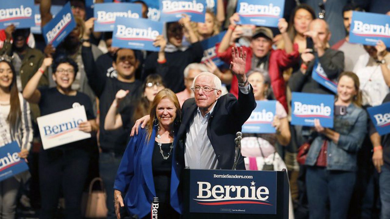Democratic presidential candidate Sen. Bernie Sanders, I-Vt., with his wife Jane O'Meara Sanders, waves his hand during a rally in El Paso, Texas, Saturday, Feb. 22, 2020. (Briana Sanchez/The El Paso Times via AP)