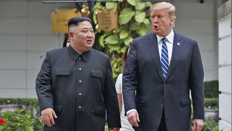 North Korean leader Kim Jong Un and President Donald Trump took a walk after their first meeting at the Sofitel Legend Metropole Hanoi hotel, Thursday, February 28, 2019, in Hanoi. (AP Photo/Evan Vucci)