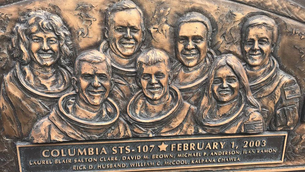 A bronze memorial at Kennedy Space Center Visitor Complex for the STS-107 crew. (Greg Pallone, Spectrum News)