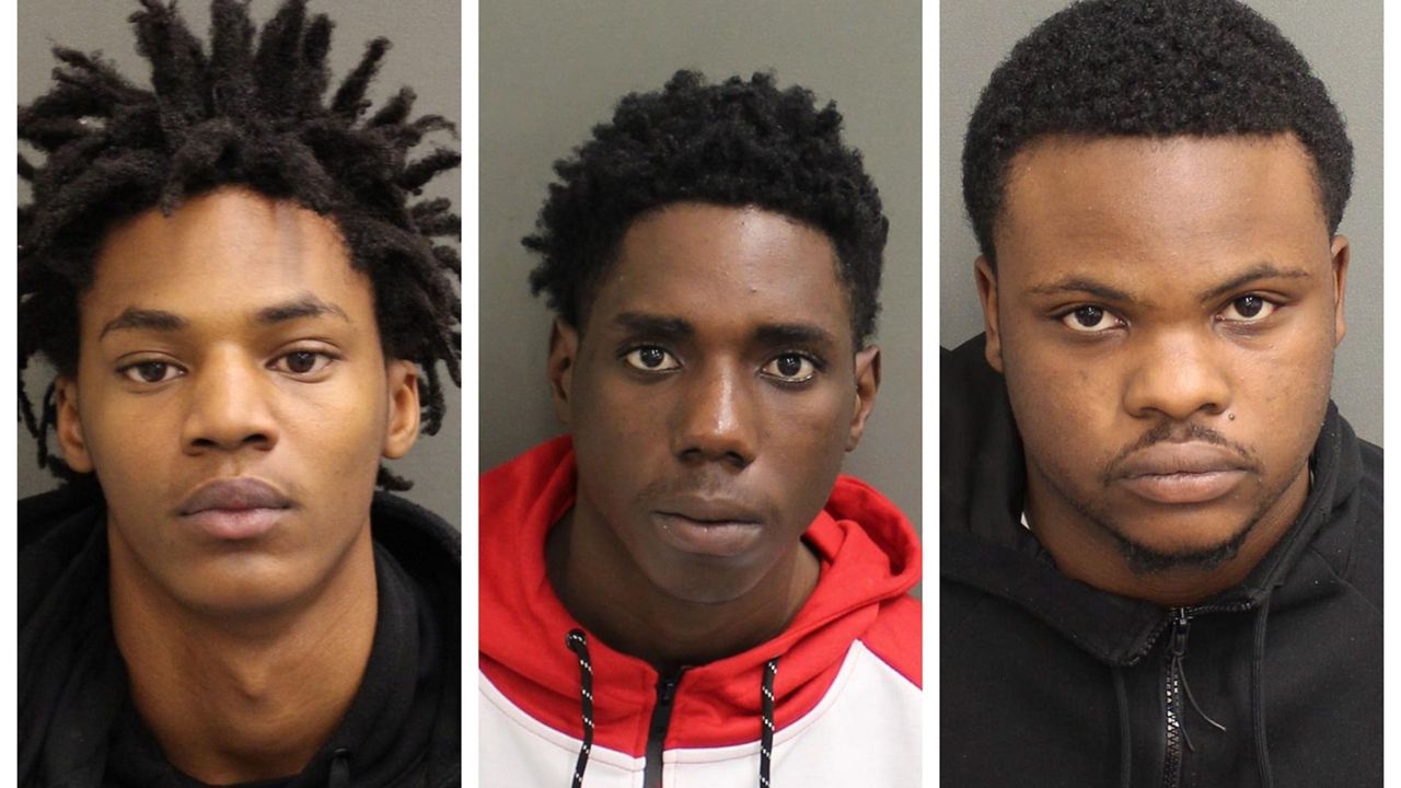 Tyquarius Smith, 19, (left), KeyShawn Epps, 19, (middle), and Markese Mosely-McNeil, 21, (right), are charged in the shooting death of Ahmad Alonzo Davis, 19. (Courtesy of the Orange County Sheriff's Office)