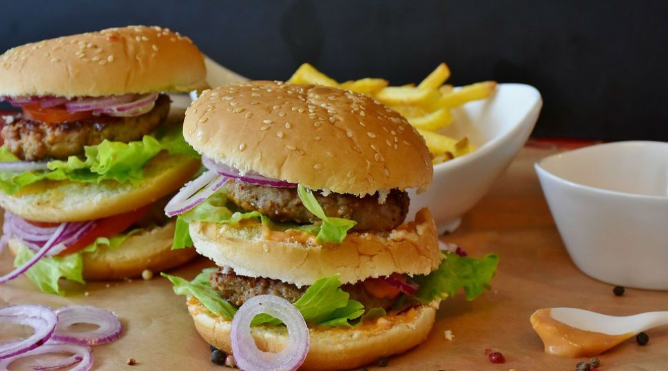 Two double-stacked burgers with a side of french fries (Stock image)