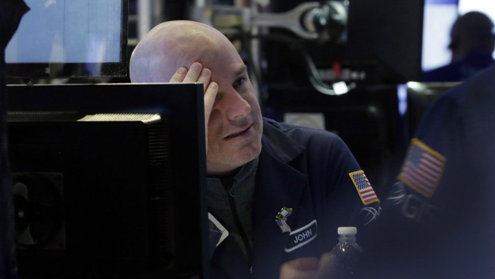 Dow slumps nearly 666 points
