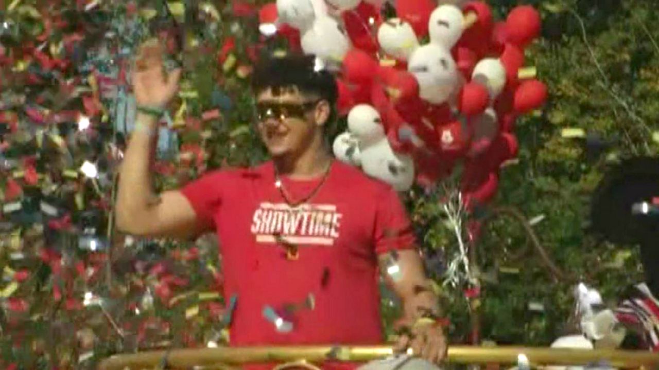 Kansas City Chiefs quarterback Patrick Mahomes rides a float down Main Street, U.S.A. at the Magic Kingdom on Monday as part of a parade celebrating the team's Super Bowl victory. (Kenneth Ashlin/Spectrum News)