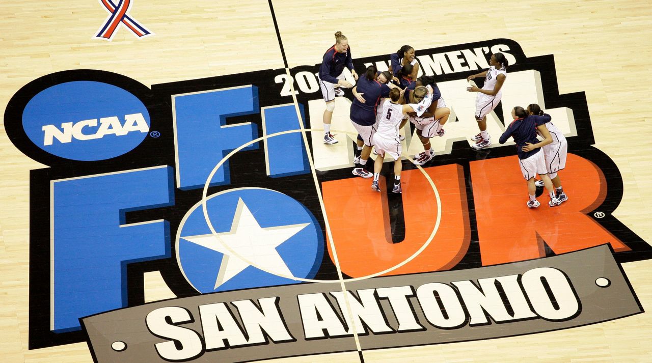 FILE - Connecticut players celebrate following the women's NCAA Final Four college basketball championship game against Stanford in San Antonio, in this Tuesday, April 6, 2010, file photo. Connecticut won 53-47. (AP Photo/Eric Gay, File)