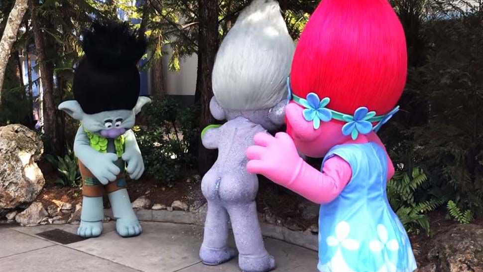 Guy Diamond, center, a glitter-farting troll from the movie "Trolls" is now greeting guests at Universal Orlando. (Courtesy of Attractions Magazine)