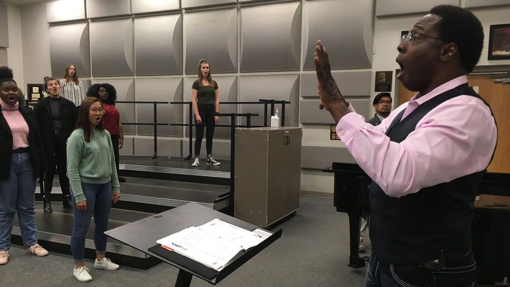 Dr. Jeffery Redding directs students at West Orange High School. The choral teacher won the 2019 Grammy Music Educator Award. (Erin Murray, Spectrum News)