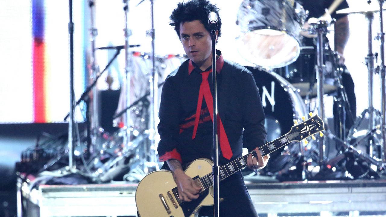 Billie Joe Armstrong, of Green Day, performs "Bang Bang" at the American Music Awards at the Microsoft Theater on Nov. 20, 2016, in Los Angeles. (Photo by Matt Sayles/Invision/AP)