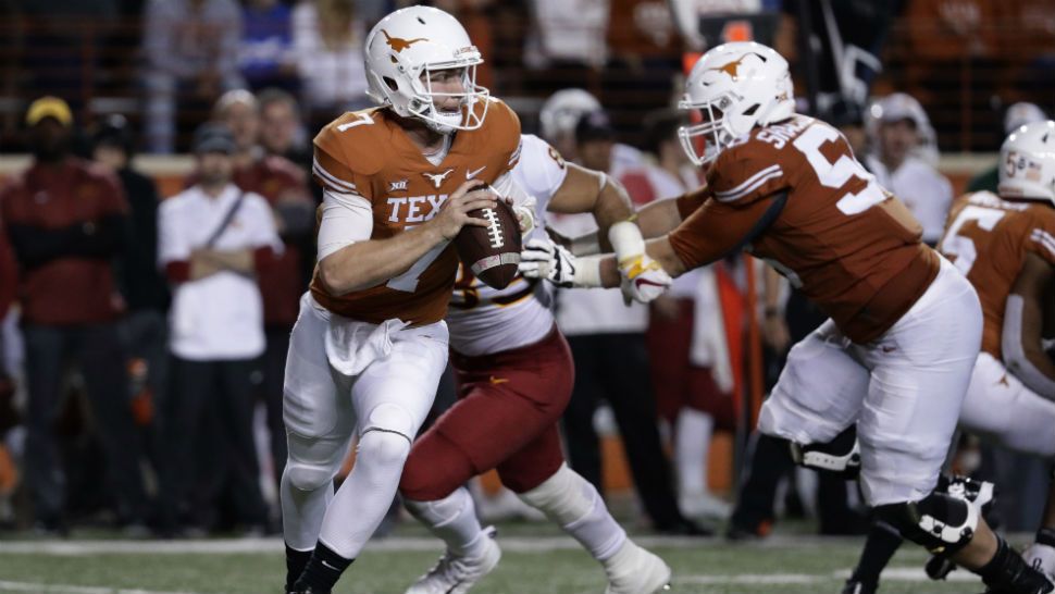 Texas quarterback Shane Buechele (7) looks to throw against Iowa State during the second half of an NCAA college football game, Saturday, Nov. 17, 2018, in Austin, Texas. (AP Photo/Eric Gay)