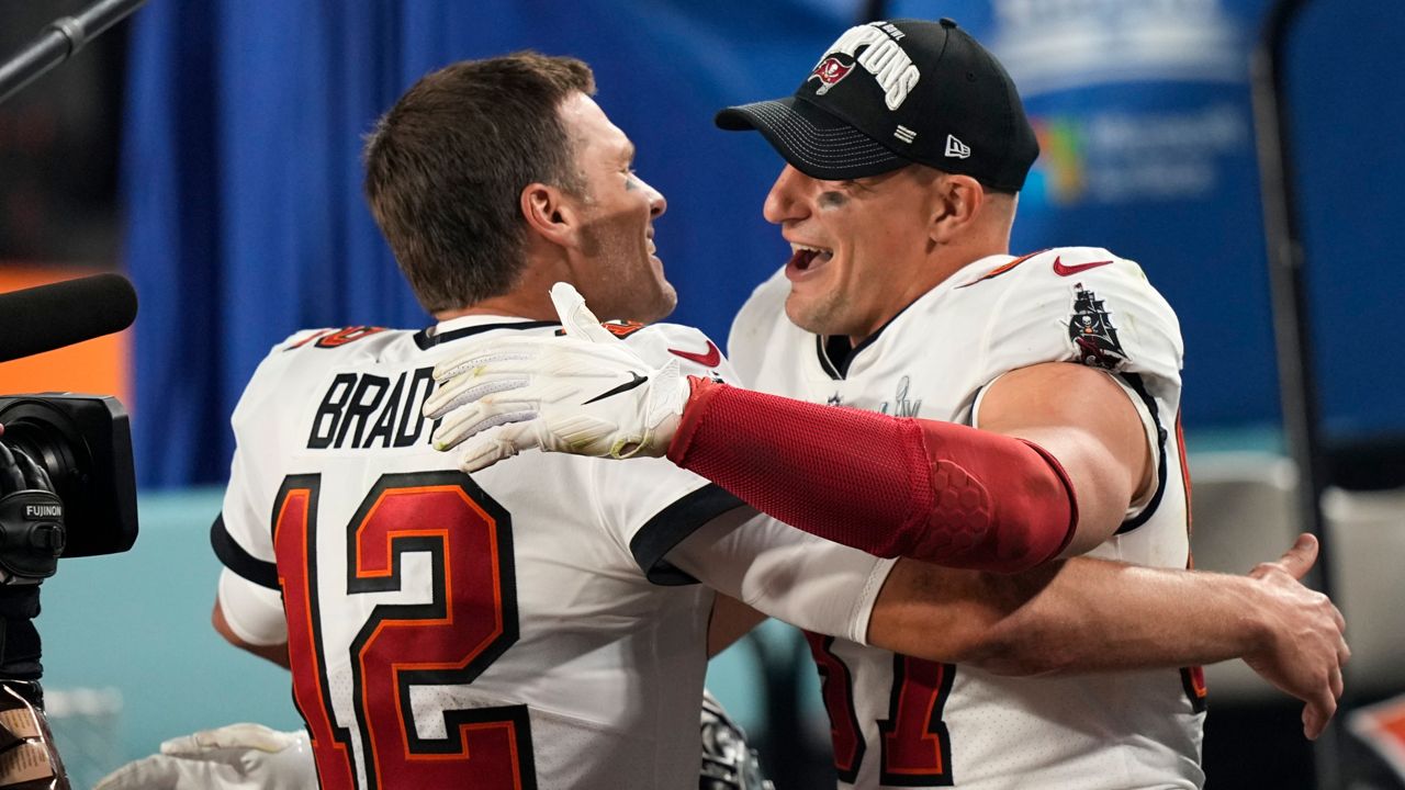 Super Bowl MVP Tom Brady, left, and teammate Rob Gronkowski celebrate their Super Bowl LV win over the Kansas City Chiefs. (AP Photo/David J. Phillip)