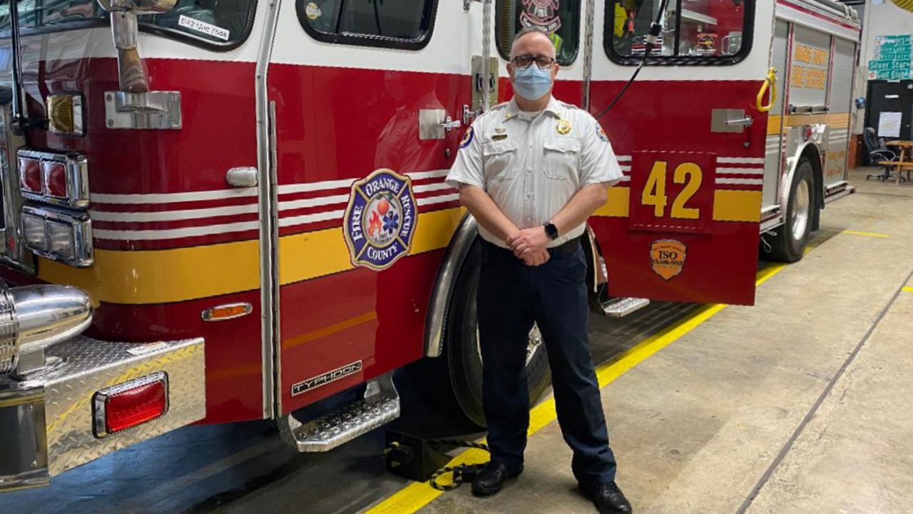 Scott Egan serves as battalion chief of emergency medical services for Orange County Fire Rescue, which touts 100 firefighters who have been trained to administer COVID-19 vaccinations. (Pete Reinwald/Spectrum News 13)