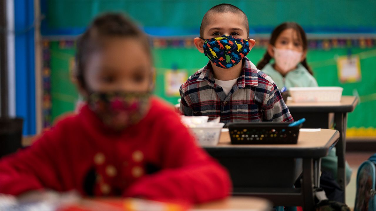 Kindergarten students sit in their classroom on the first day of in-person learning at Maurice Sendak Elementary School in Los Angeles, Tuesday, April 13, 2021. (AP Photo/Jae C. Hong)