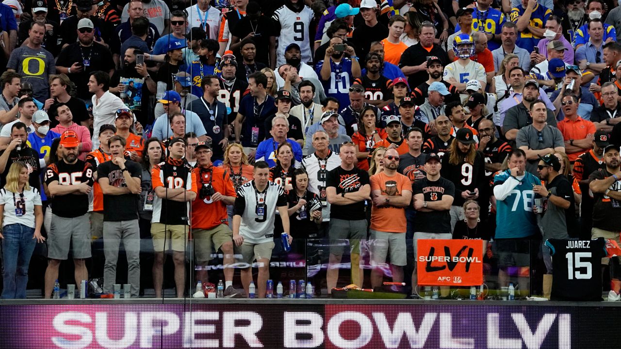 Fans watch during the first half of the NFL Super Bowl 56 football game between the Los Angeles Rams and the Cincinnati Bengals Sunday, Feb. 13, 2022, in Inglewood, Calif. (AP Photo/Tony Gutierrez)