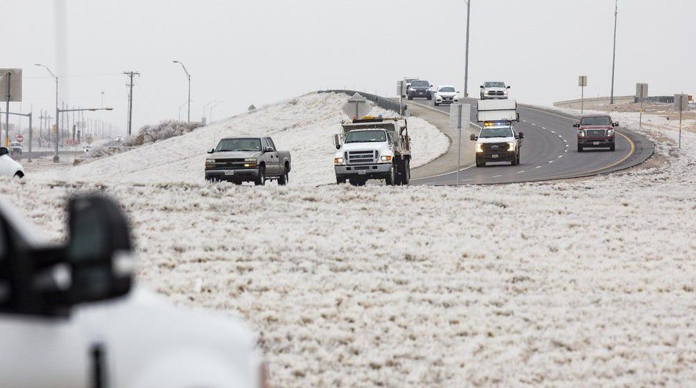 Motorist drive east on Texas State Highway 191 headed towards Midland from Odessa Friday, Feb. 12, 2021, in Midland County, Texas. (AP Photo|Odessa American, Jacob Ford)/Odessa American via AP)