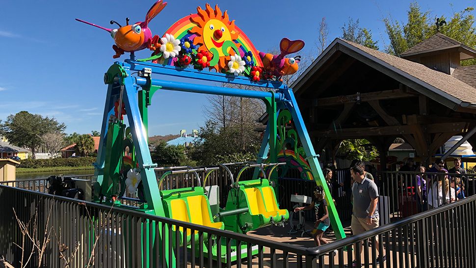 Give Kids The World Village opened Kelly's Sunny Swing, a wheelchair-accessible ride, on Thursday. (Ashley Carter/Spectrum News)
