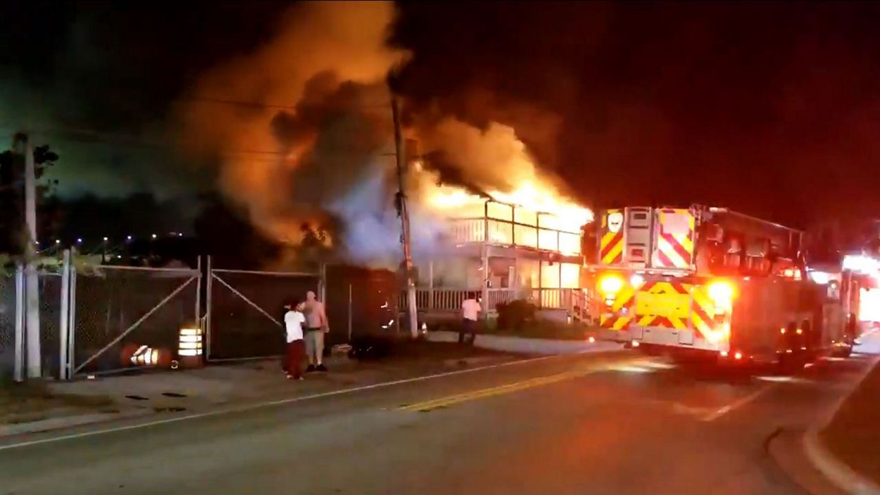 Orlando Fire Department personnel fighting a fire at a rooming house on W. Washington Street, Saturday, February 15, 2020. (Courtesy: Orlando Fire Department)