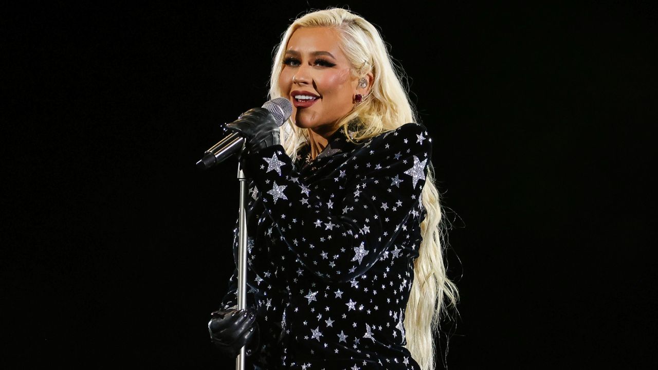 Christina Aguilera performs at the AIDS Healthcare Foundation's (AHF) free, sold-out concert marking World AIDS Day and AHF's 35th anniversary at a star-studded event the iconic L.A. Forum in Inglewood, California on Wednesday, December 1, 2021. (Mark Von Holden/AP Images for AIDS Healthcare Foundation)