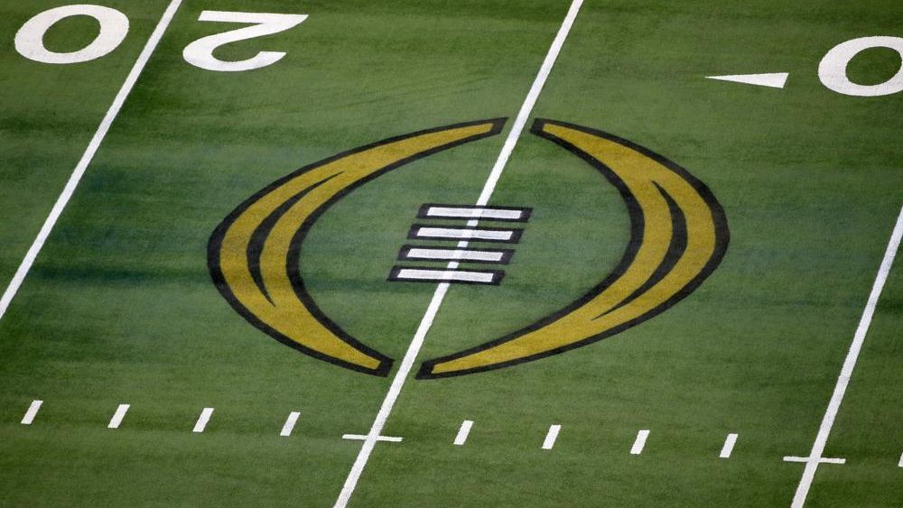 The College Football Playoff logo is shown on the field at AT&T Stadium before an NCAA college football game in Arlington, Texas, Jan. 1, 2021. (Associated Press file photo)