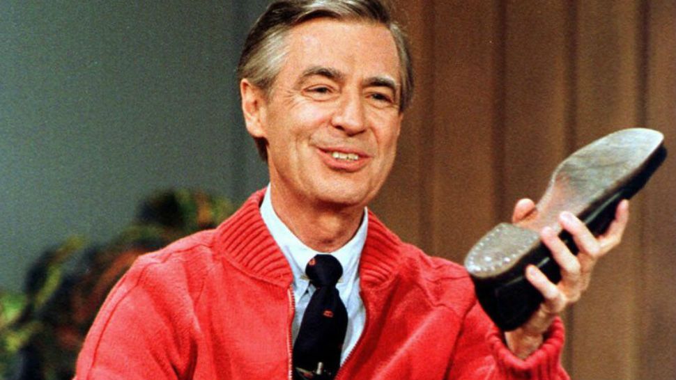 FILE - This June 28, 1989, file photo, shows Fred Rogers as he rehearses the opening of his PBS show “Mister Rogers’ Neighborhood” during a taping in Pittsburgh. (AP Photo/Gene J. Puskar, File)