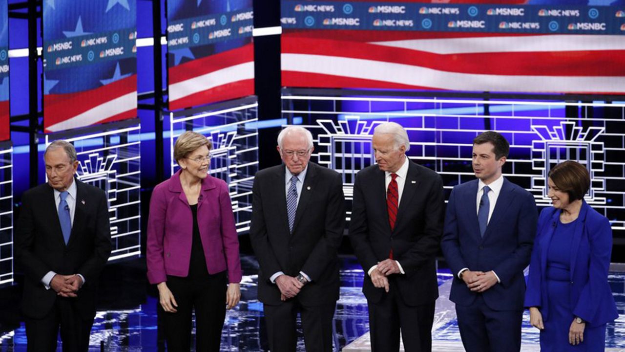 From left, Democratic presidential candidates, former New York City Mayor Michael Bloomberg, Sen. Elizabeth Warren, D-Mass., Sen. Bernie Sanders, I-Vt.,former Vice President Joe Biden, former South Bend Mayor Pete Buttigieg, Sen. Amy Klobuchar, D-Minn., stand on stage before last week's Democratic presidential primary debate in Las Vegas. (AP Photo/John Locher)