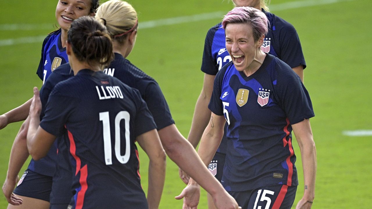 United States forward Megan Rapinoe (15) celebrates after scoring a goal during the second half of a SheBelieves Cup women's soccer match against Brazil, Sunday, Feb. 21, 2021, in Orlando, Fla. (AP Photo/Phelan M. Ebenhack)