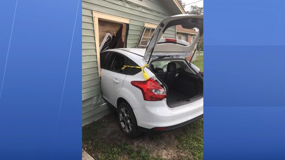 Haines City Police responded to the home on Lake Avenue around 3:30 p.m. where they found Dustin Donahoe, 27, entrapped inside his 2014 white Ford Focus. (Haines City Police Department)