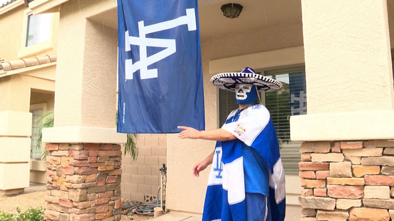 Dodger 'Fan Behind the Mask' Spreads Positive Message