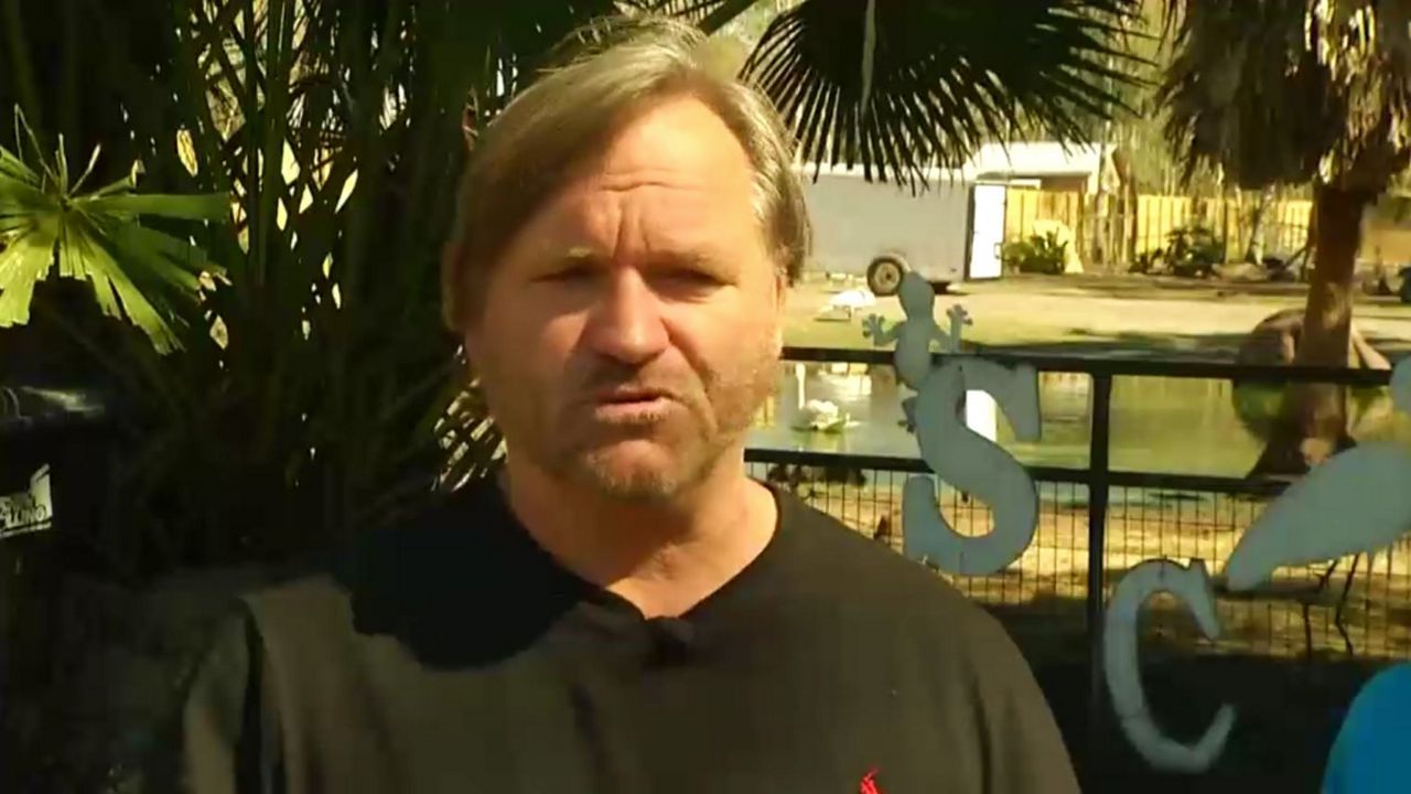 In this image from video shot in February 2019, Jim Bronzo speaks a couple of days after a fire gutted his wildlife sanctuary in east Orange County. (Spectrum News 13 file)