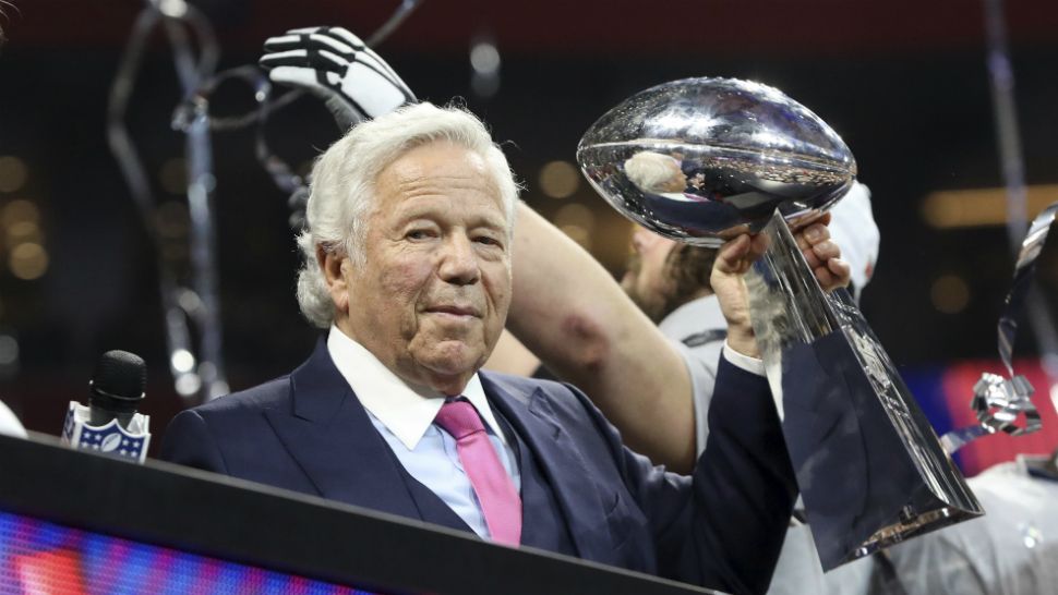 New England Patriots owner Robert Kraft hoists the Super Bowl trophy after his team beat the Los Angeles Rams 13-3 in Super Bowl LIII in Atlanta on February 3. (Gregory Payan/AP)