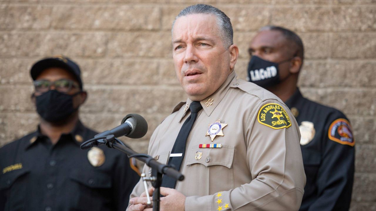 Los Angeles County Sheriff Alejandro Villanueva speaks during a press conference in front of Sheriff Department building in Lomita, Calif., Feb. 23, 2021. (AP Photo/Kyusung Gong)