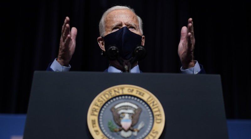 In this Feb. 11, 2021, file photo, President Joe Biden speaks during a visit to the Viral Pathogenesis Laboratory at the National Institutes of Health in Bethesda, Md. (AP Photo/Evan Vucci, File)