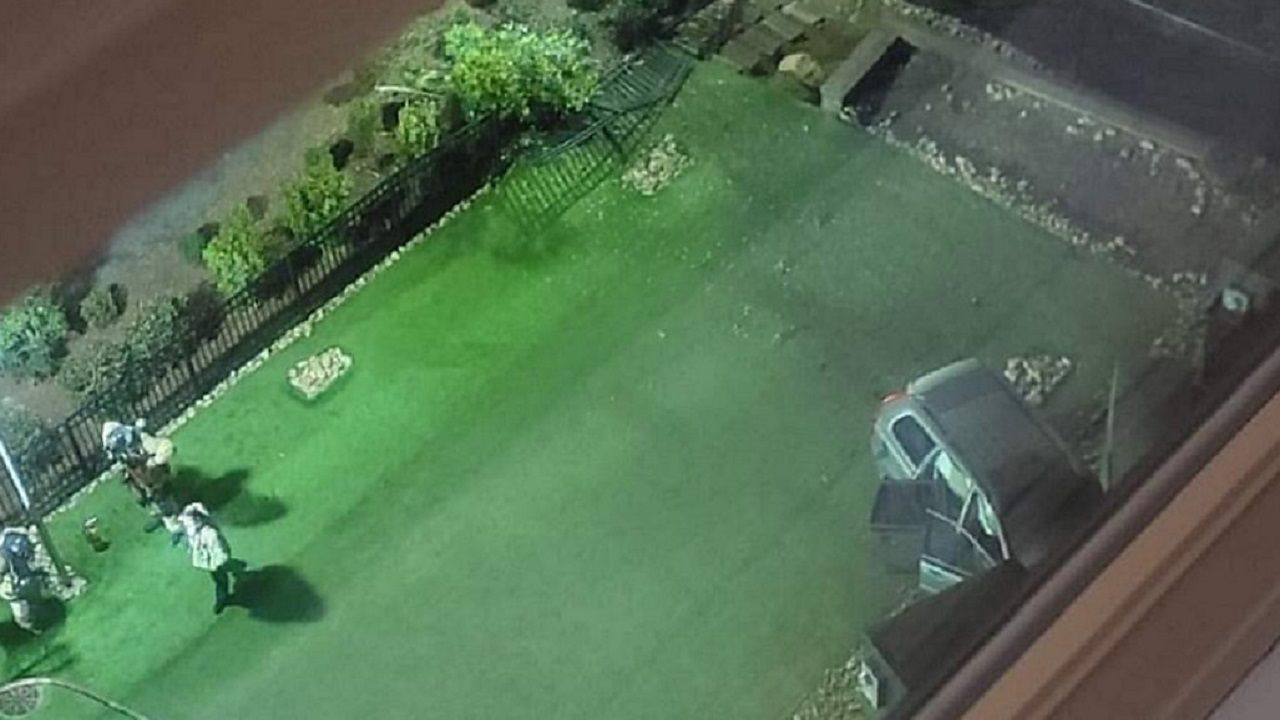 An SUV crashed through the black gates and struck a generator early Saturday morning at the Savoy Apartments in Charlotte. (Courtesy Justin Baine)