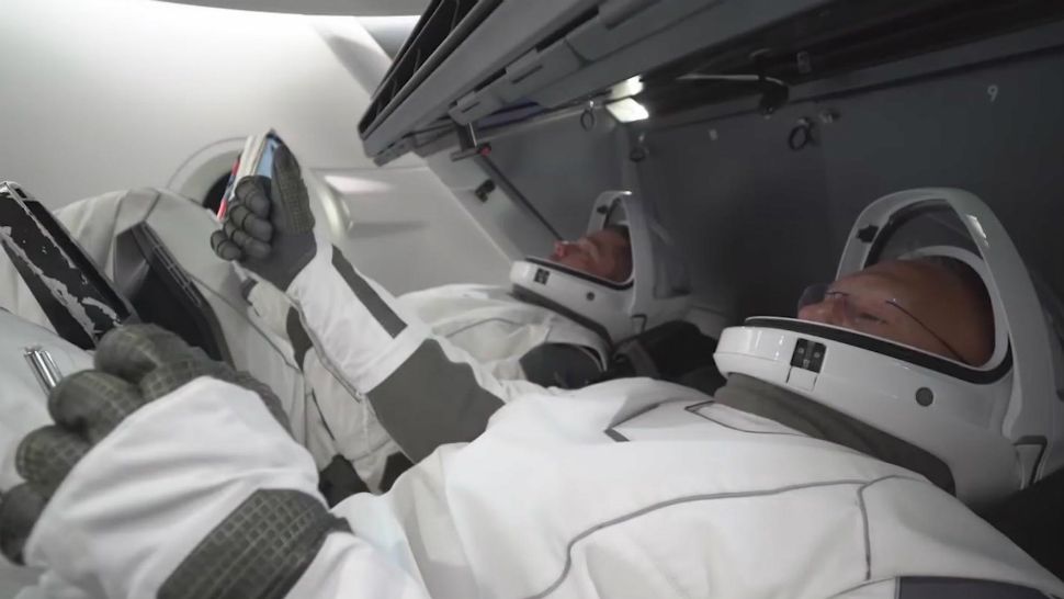 An undated promotional video for the Crew Dragon depicts several astronauts aboard the spacecraft. (SpaceX)