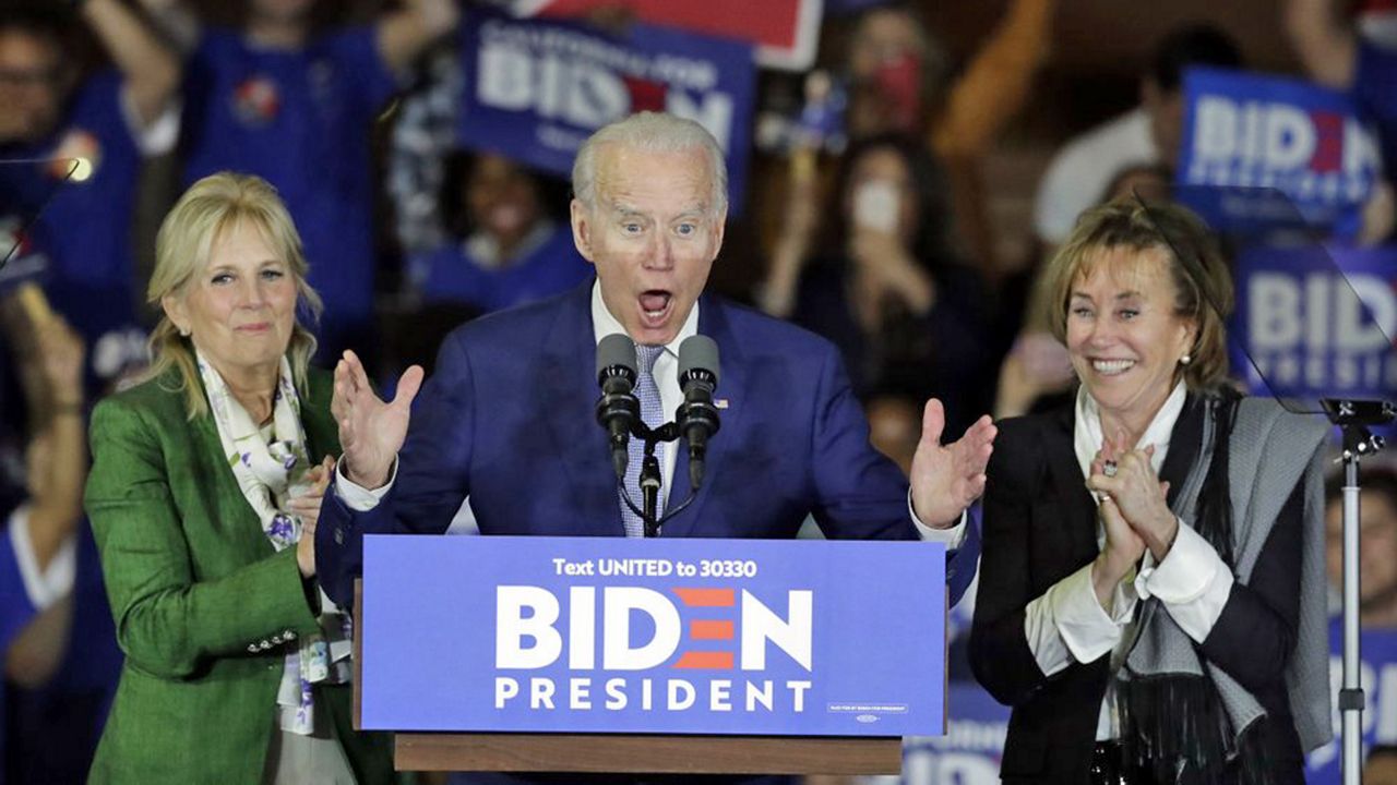 Former Vice President Joe Biden on stage with his family in Los Angeles after a string of wins in the Super Tuesday primaries. (Associated Press)