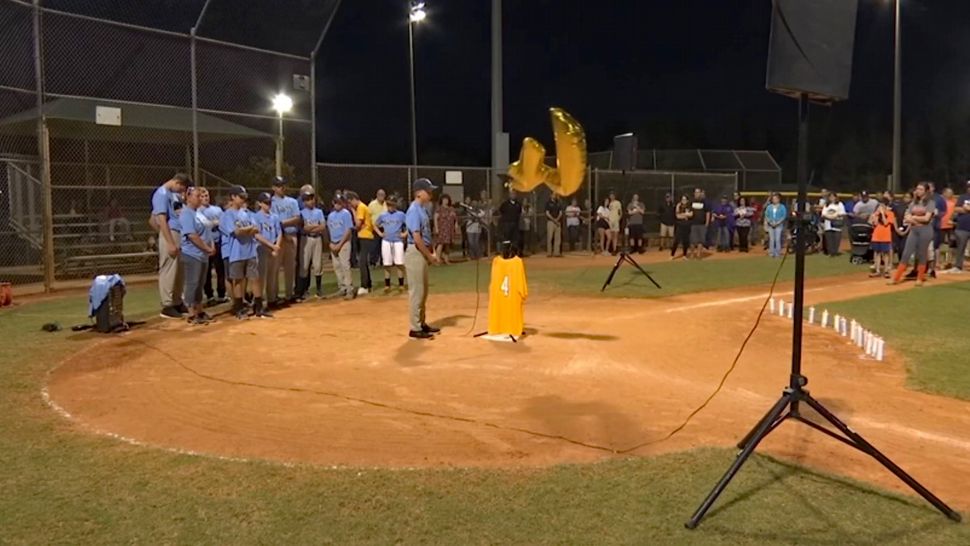  Family, friends and teammates gathered at Bell Keller Park where Joshua Durner played on the baseball team. His number 4 jersey was placed at home plate and the scoreboard lit up all fours. (Joh Ficurilli/Spectrum News 13)