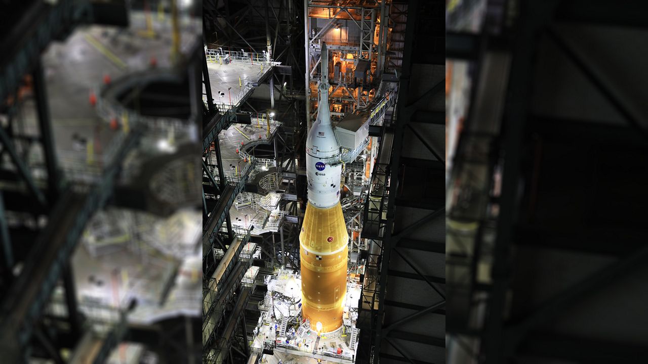 The Space Launch System rocket is 322 feet tall and sitting on its top is the Orion spacecraft, which will carry humans back to the moon. (NASA)