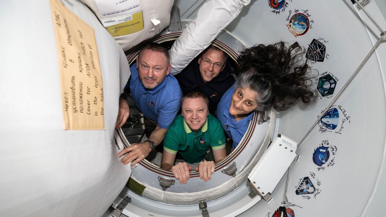 "NASA’s SpaceX Crew-9 members pose together for a portrait inside the vestibule between the International Space Station and the SpaceX Dragon crew spacecraft. Clockwise from left, are NASA astronauts Butch Wilmore, Nick Hague, and Suni Williams, and Roscosmos cosmonaut Aleksandr Gorbunov," stated NASA. (NASA)