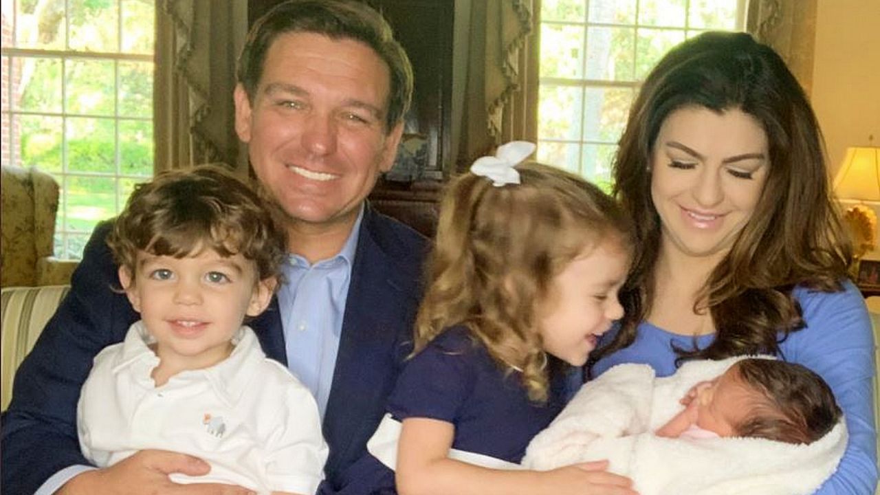 Gov. Ron DeSantis and his wife Casey DeSantis welcomed their third child, Mamie, as Mason looks on and older sister Madison smiles at the family's new addition. (Casey DeSantis)