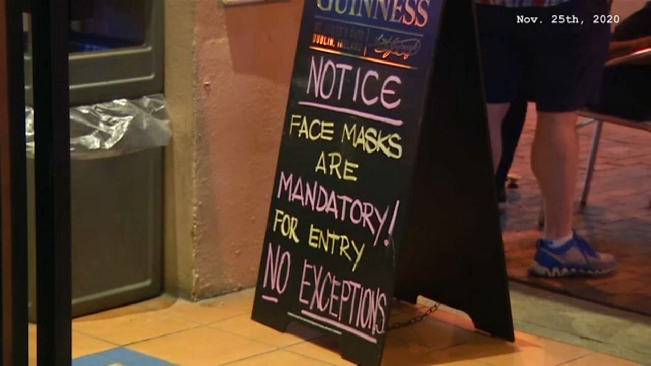 Orange County businesses are required to post signage reminding patrons about mandatory indoor face-mask use. (File)