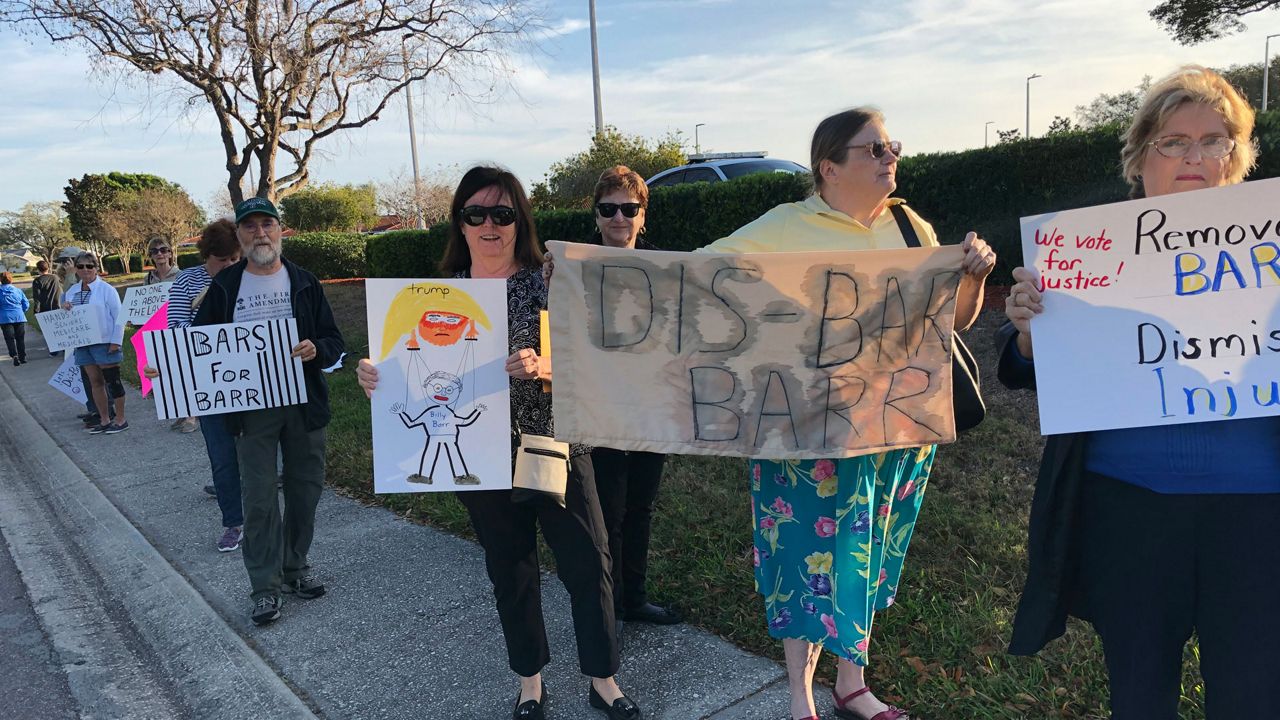 Sun City Center residents protesting ahead of a scheduled appearance by U.S. Attorney General William Barr at a "Keeping Seniors Safe" summit Tuesday, March 3, 2020. (Mitch Perry/Spectrum Bay News 9)