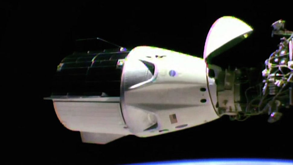 SpaceX Crew Dragon docks at the International Space Station. (Courtesy of NASA TV)