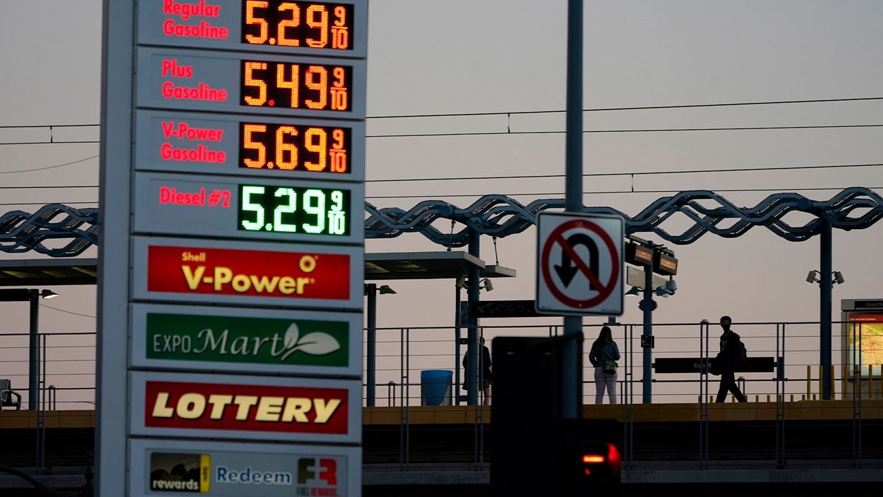 Gas prices are advertised at over five dollars a gallon Monday, Feb. 28, 2022, in Los Angeles. (AP Photo/Marcio Jose Sanchez)