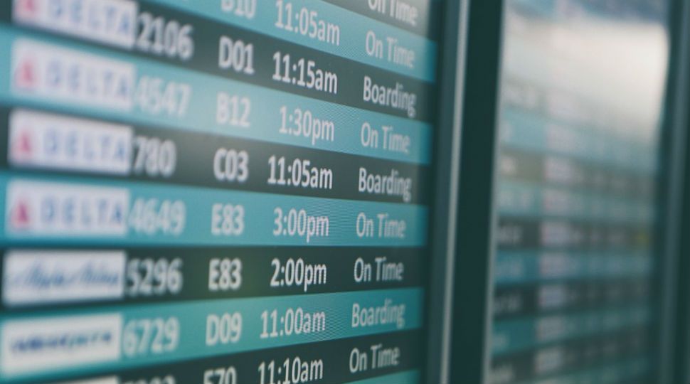 Photo of flight status screen (Spectrum News)