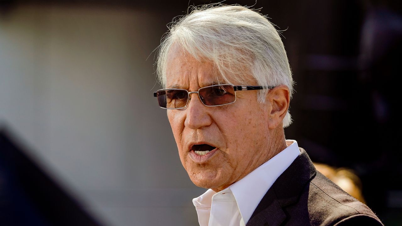 In this Oct. 1, 2020, file photo, former San Francisco District Attorney George Gascon speaks at a Los Angeles County Democratic Party news conference outside the Staples Center in LA. (AP Photo/Damian Dovarganes)