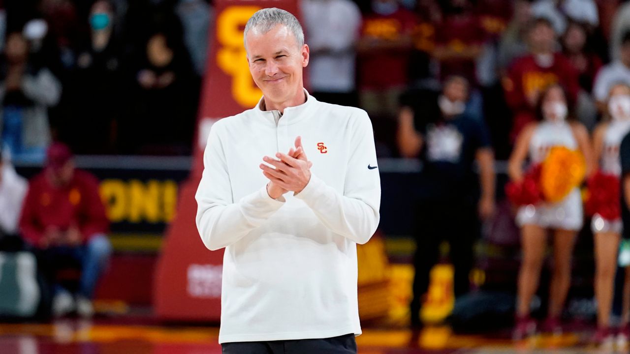 Southern California head coach Andy Enfield stands on the court before an NCAA college basketball game against Washington State Sunday, Feb. 20, 2022, in Los Angeles. (AP Photo/Marcio Jose Sanchez)