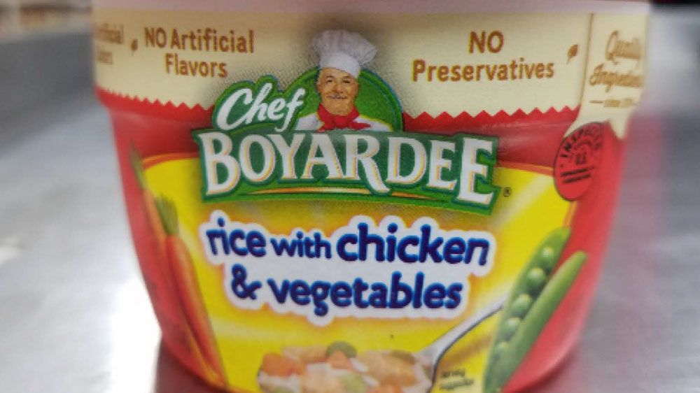The containers are labeled "Rice with Chicken and Vegetables." There's actually beef ravioli inside. (USDA)