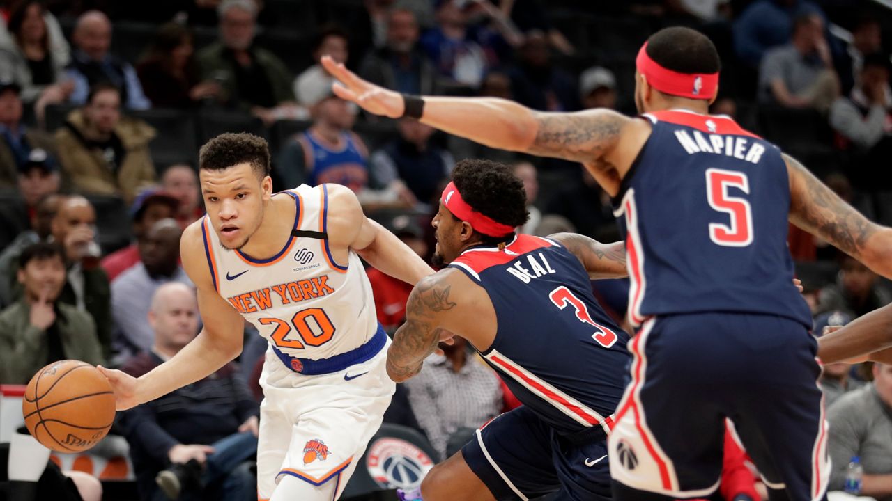 New York Knicks' Kevin Knox II facing the Washington Wizards at a game in Washington on March 10, 2020.