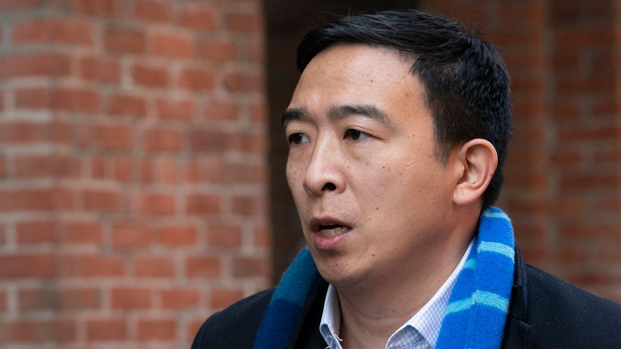 A March 11, 2021, file photo of Democratic mayoral candidate Andrew Yang holding a news conference in the Dumbo neighborhood of New York