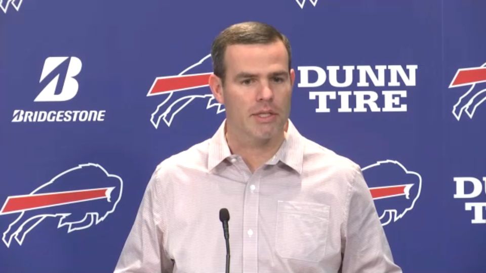 Buffalo Bills - Brandon Beane and a fan. 