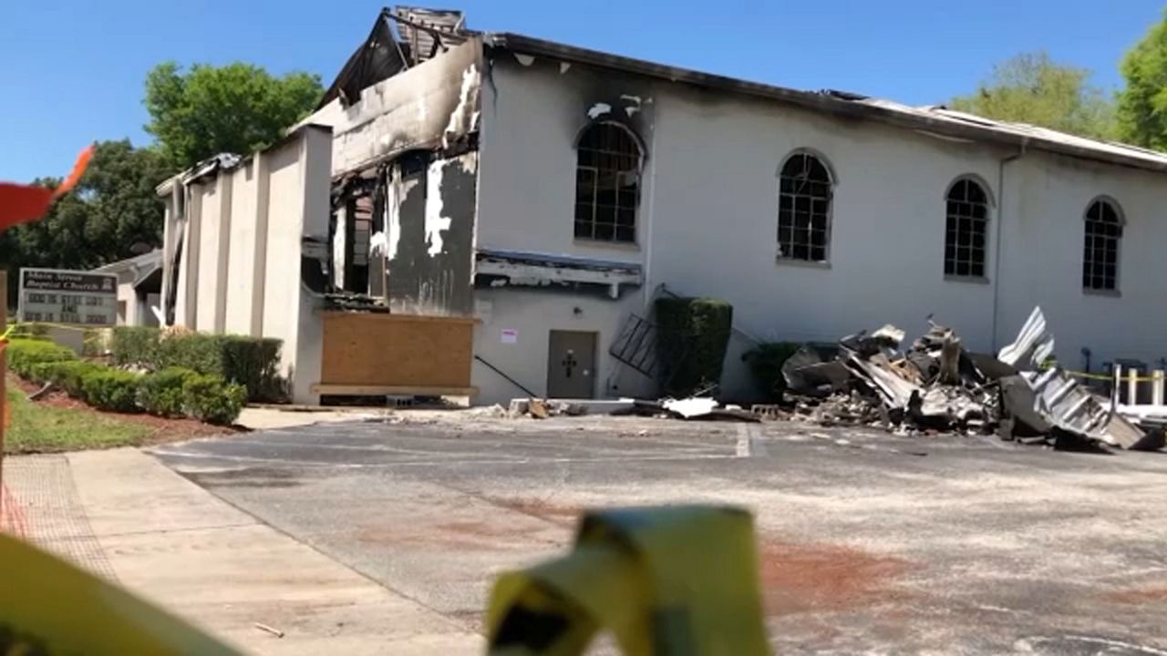 Bartow church rebuilding, while praying for woman charged