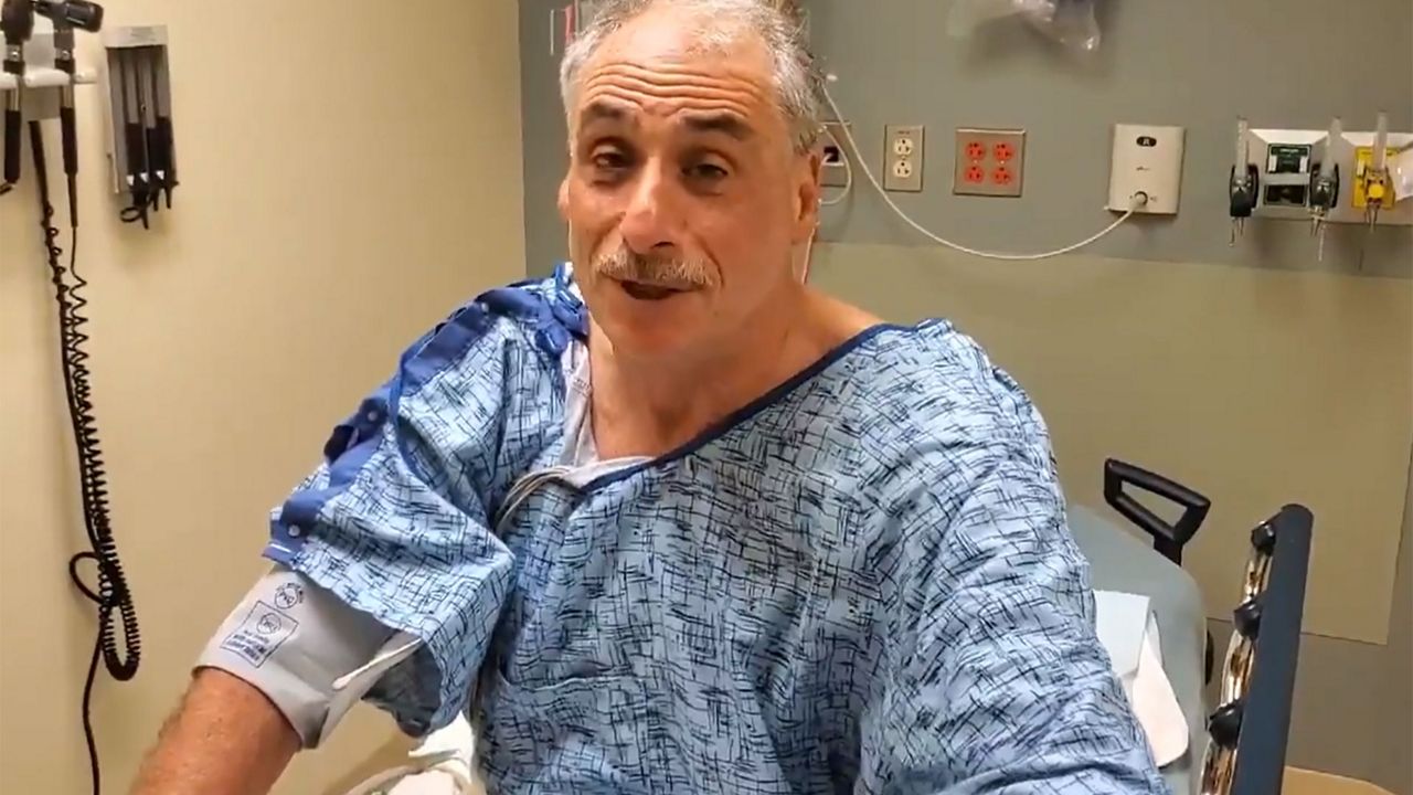 Volusia County Sheriff Mike Chitwood speaks from Halifax Health Center after being hit by a car Thursday. (Mike Chitwood via Twitter)